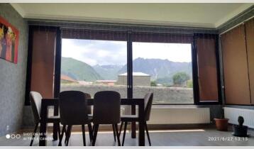 (Auto Translate!) Newly renovated apartment for sale in Kazbegi, in the village of Garbani. Total 3 rooms, 2 bedrooms with their own bathrooms, studio type living room. Additional bathrooms at the entrance. All appliances and furniture remain in the house, except for the bedroom beds. There is also an old building next to the house, which can be used as a storeroom. Yard area 2028 mW. The house is very good for business, for renting an apartment. The tourist is in winter because he is close to Kobi ropeway and he is also renting during the winter season. There are many more things in the house than can be seen in the photos.
