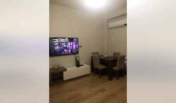 (Auto Translate!) For sale in a newly built house on Kavtaradze in the prestigious "New Group" building. 74 square meter apartment, with two bedrooms, furniture, appliances,