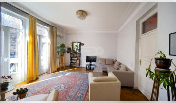 (Auto Translate!) Three-room apartment for sale, total area 108 sq.m., on the third floor, the balconies go to the side of Rustaveli avenue and to the inner yard. Entrance with a large balcony, one bedroom has a balcony, the second bedroom has a sliding door, together with: a large shower. It is possible to add a small toilet in the window, on the side of the bedroom. The oak parquet is in very good condition. Central heating is installed. A new iron door has been inserted. The renovation is about 5 years old