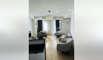 (Auto Translate!) A 3-room furnished apartment is for sale in Ortachala, Bezhan Kalandadze 15, in the Monolithi City complex. The built-in furniture and appliances remain in the apartment.