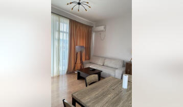 (Auto Translate!) Bright 2-room corner apartment for sale in Bagevi, 56 sq.m. Studio type living room, bedroom and 1 bathroom. The apartment is equipped with furniture and all necessary appliances, which will remain in the apartment. The building is served by 3 