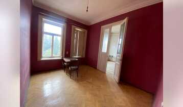 (Auto Translate!) An apartment for sale in the city center, 3 minutes' walk from Rustaveli metro station and Freedom Square. The apartment has preserved authentic wooden windows with shutters, wooden parquet and doors. The apartment is under renovation.
