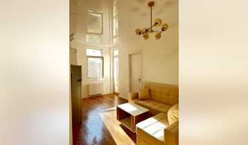 (Авто перевод!) Продается 2-комнатная квартира-студия в строящемся жилом доме по улице Михаила Бурдзгла.