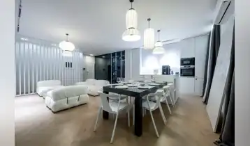(Auto Translate!) We offer a unique apartment in Tbilisi Gardens-premium class living space with modern design, high quality repairs and city panoramic views. The apartment is an ideal choice for those who value comfort, environmentally friendly environment and sophisticated style.

Among the advantages of Tbilisi Gardens is an environmentally friendly and prestigious location that is ideal for living. The building is built under international security standards and offers panoramic views on the mountains and the city. The complex includes 21,000 m² of green zones, central parks and modern infrastructure facilities. There is also a 25-meter swimming pool, a fitness center and a play area for children. Security is taken care of 24/7 protection and video surveillance system.

The advantages of the apartment include premium repairs made with the highest quality materials and modern design, fully relevant international standards. The interior is equipped with Motif and Naterial's premium furniture, Italian Flos chandeliers and modern electrical systems of Legrand. The elegant décor of Jonathan Adler gives the interior a special sophistication.

The apartment is fully equipped with Bosch techniques, which include air conditioners, refrigerator, stoves, microwave oven, stove, washing and drying machines, vent and wine refrigerator. The kitchen is arranged professionally and consists of Zwilling and Alessi kitchen inventory as well as Delonghi coffee machines.

The Harman Kardon audio system is installed in the apartment for vital comfort, providing high quality music experience, and part of the interior is also a mini collection of premium drinks.